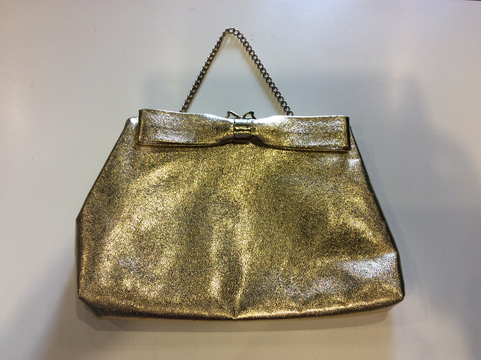 Gold bow purse
